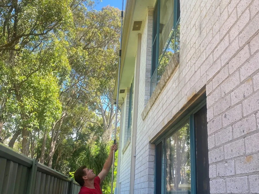 Safety-First Gutter Cleaner in use at home